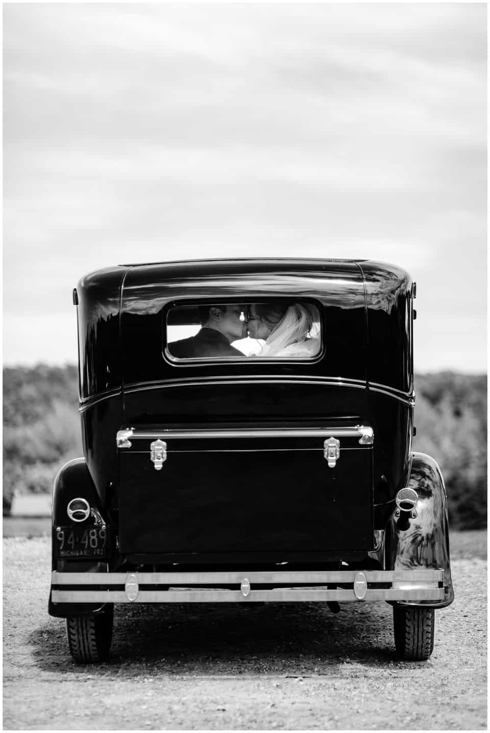 Aurora Cellars Wedding bride and groom in Model A Car for wedding