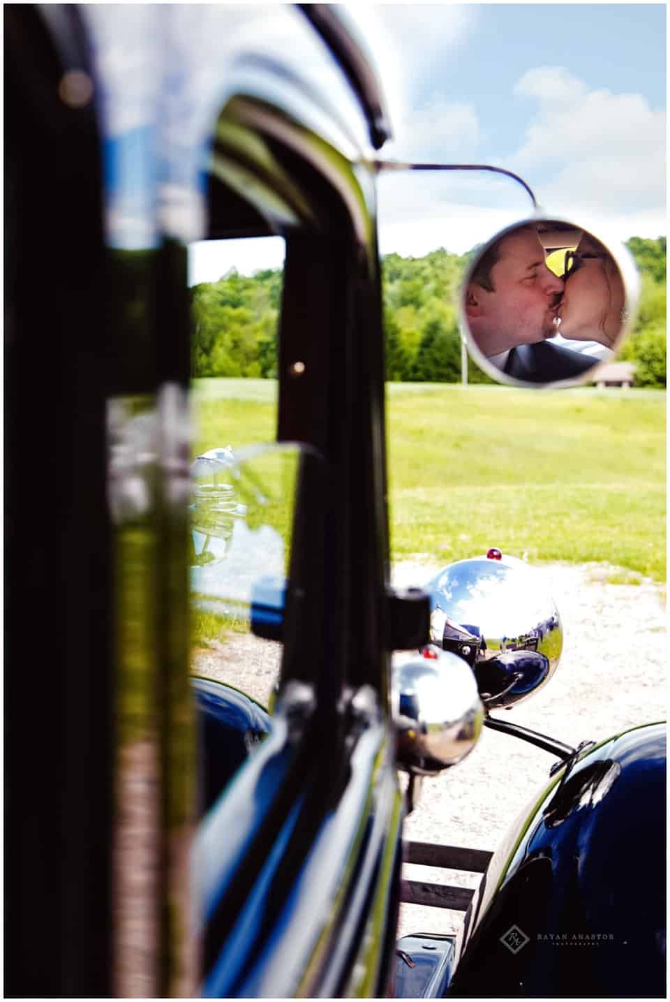 bride and groom in Model A Car for wedding