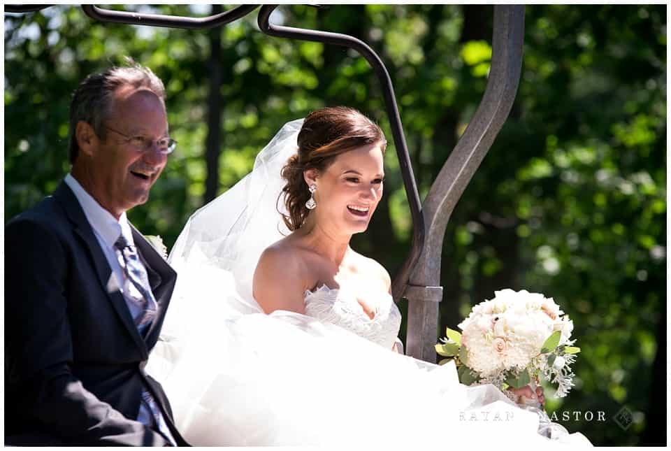 bride getting off chair lift to be married