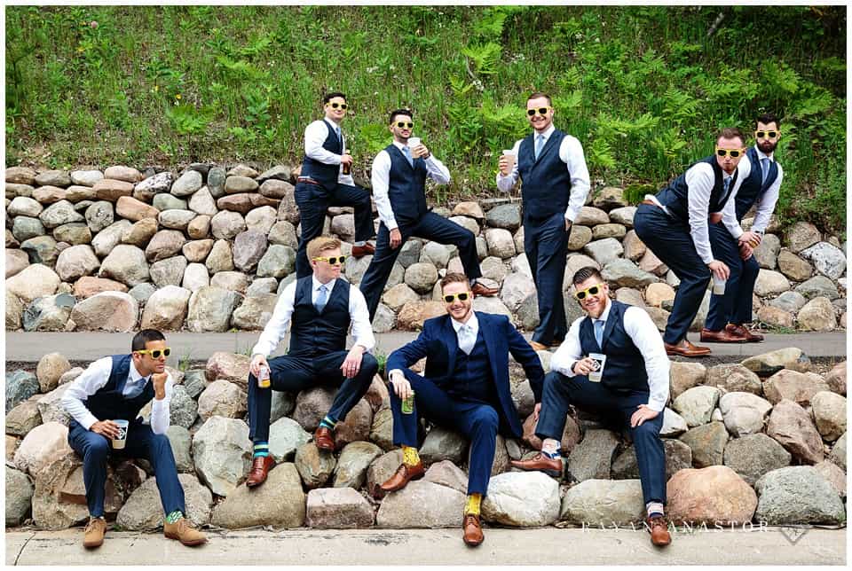 groomsmen on rocks