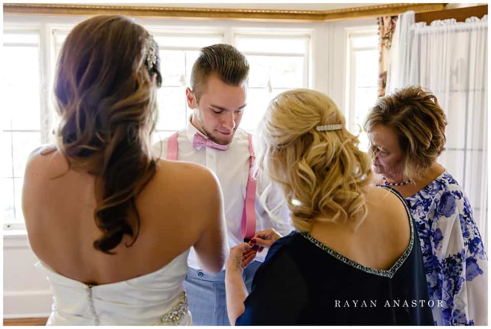 bride getting ready at kellogg manor house