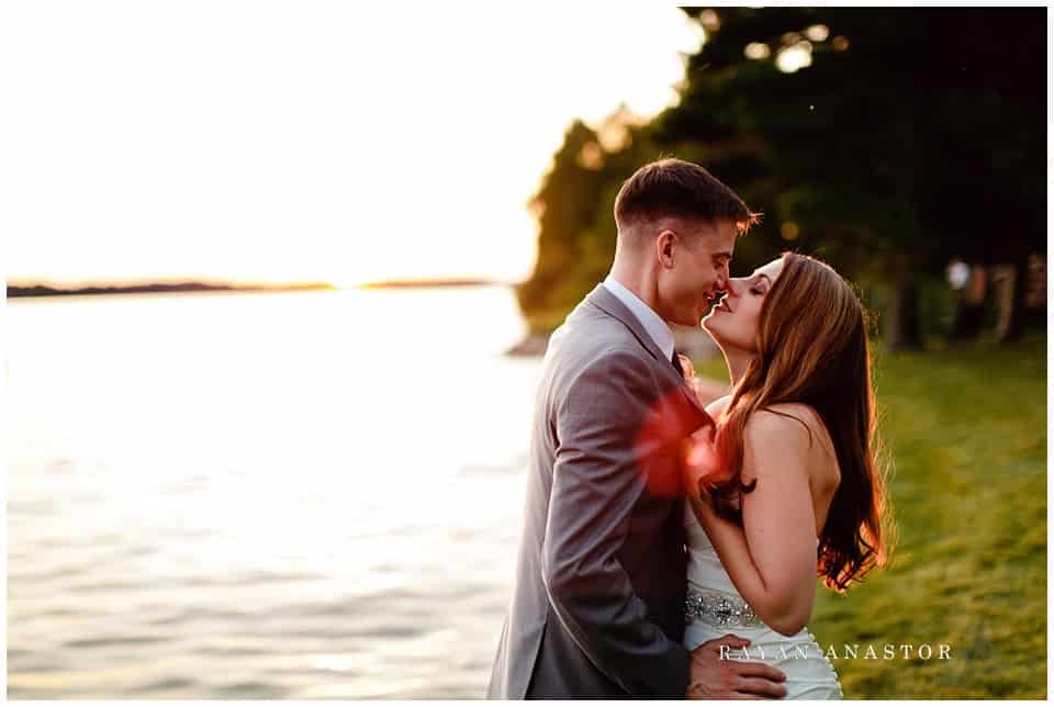 bride and groom at sunset on gull lake