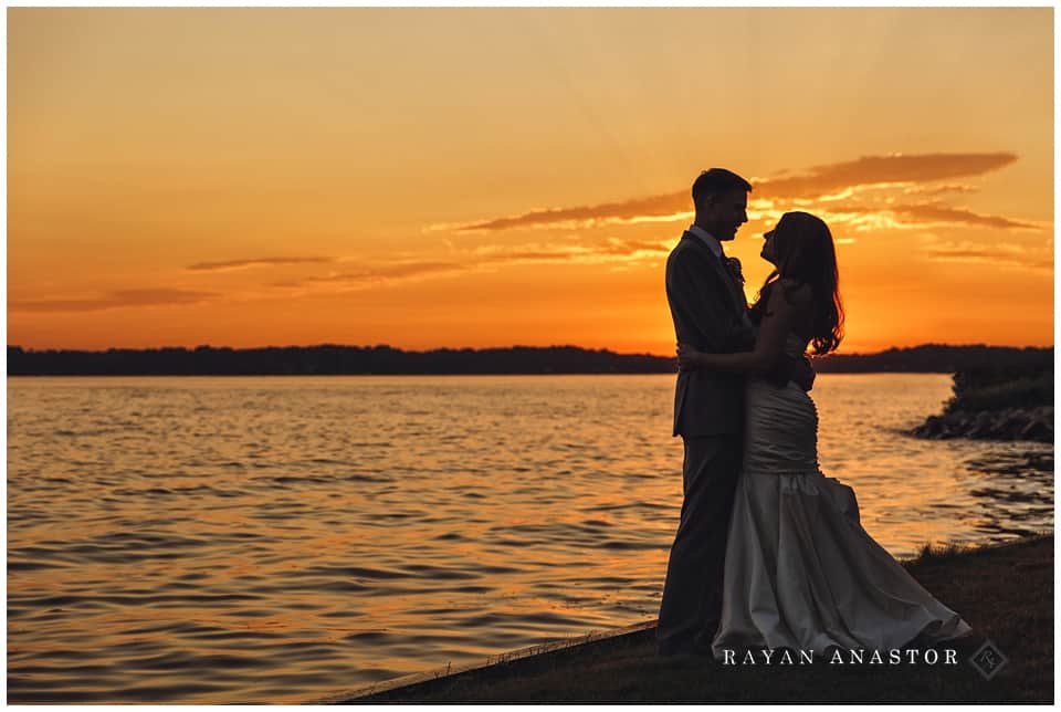 bride and groom at sunset on gull lake
