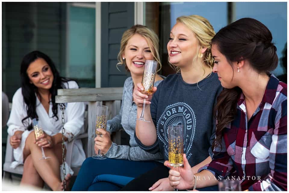 bride and her ladies relaxing on the porch at harbor lights resort