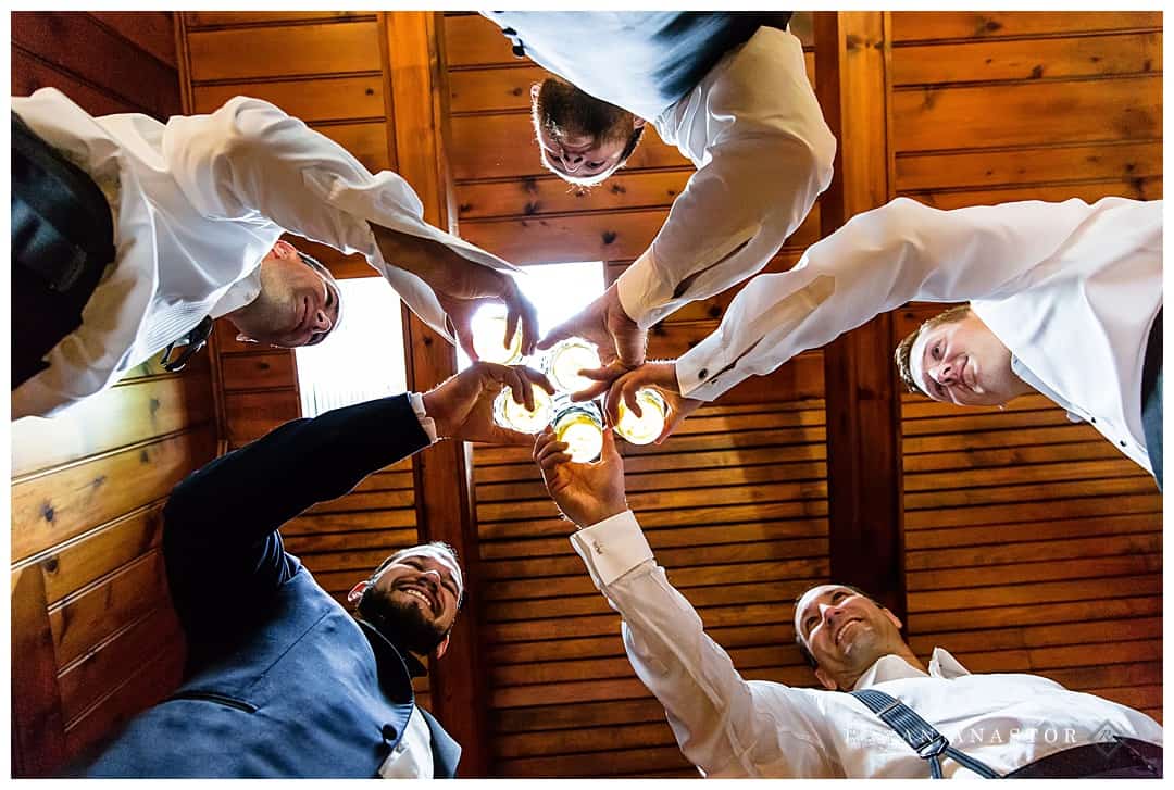 groomsmen toasting before wedding