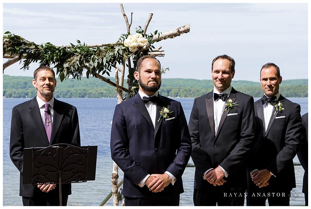 groom crying seeing bride