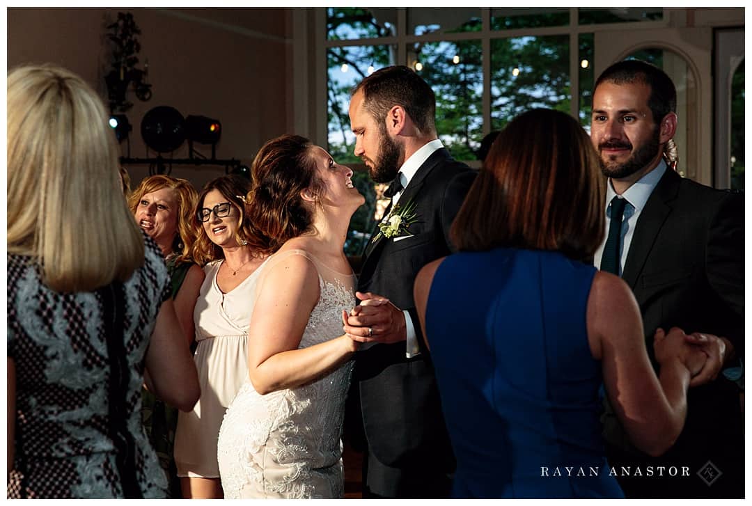 bride and groom dancing at reception