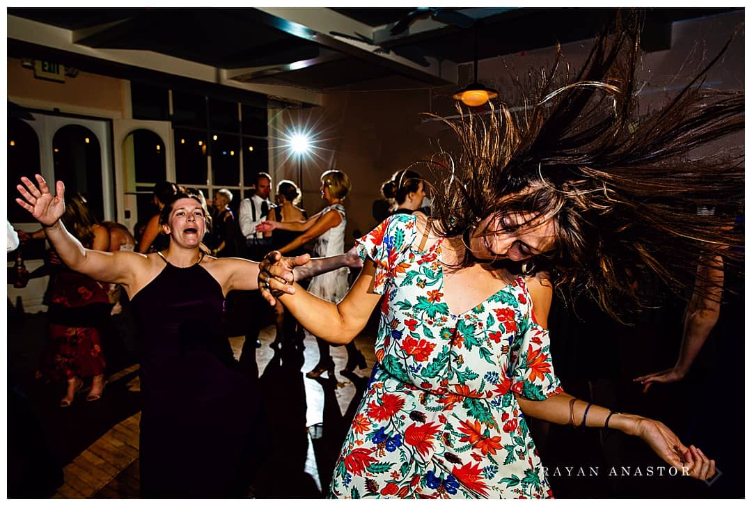 wedding guest flinging hair dancing