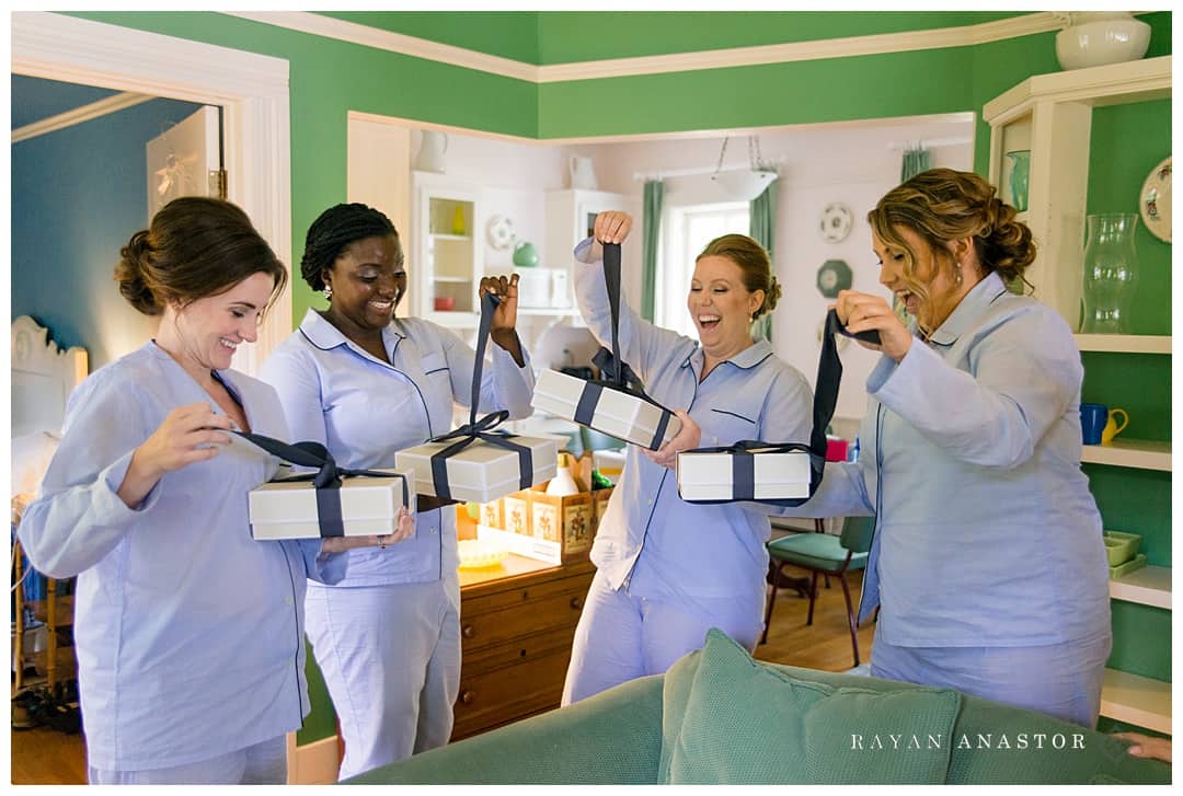 bridesmaids opening gifts