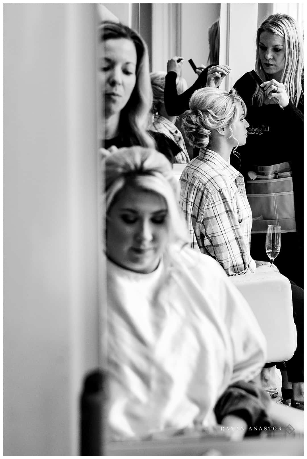 bride and sister having hair done