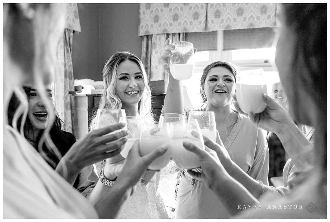 bridesmaids toast on wedding day