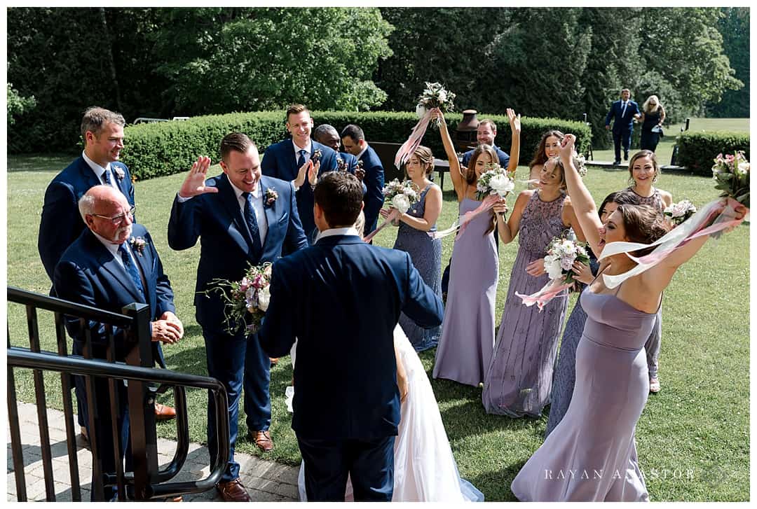 outdoor wedding with floral arch