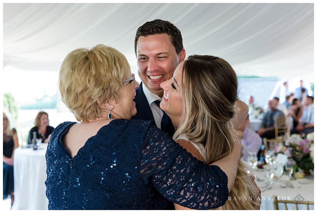 family hug at wedding