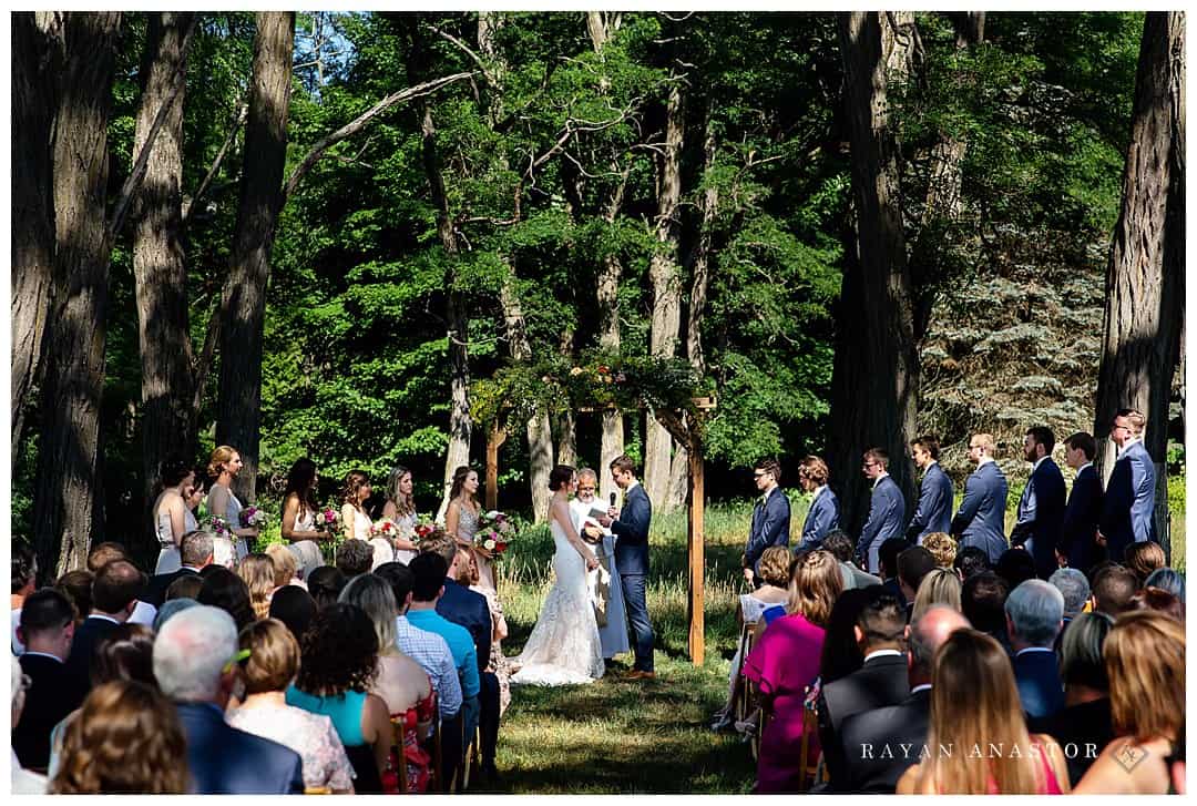 wedding under locust trees in northern michigan
