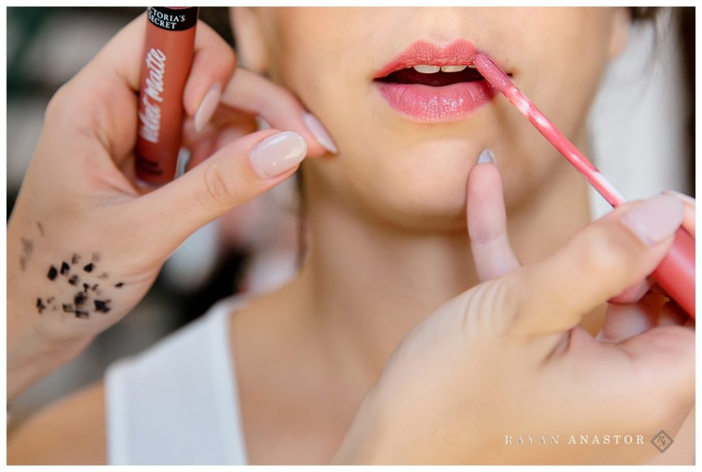 MO Hair and Beauty applying brides lipstick