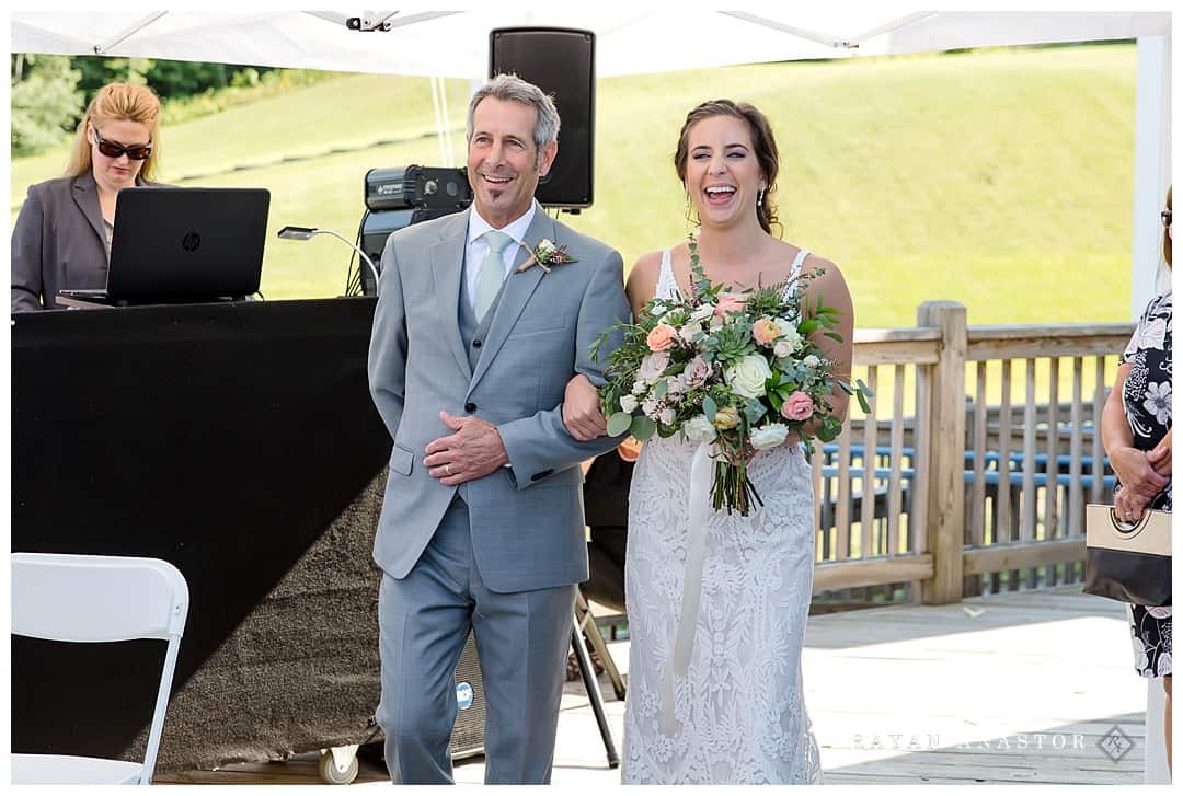 bride smiling when she sees her groom