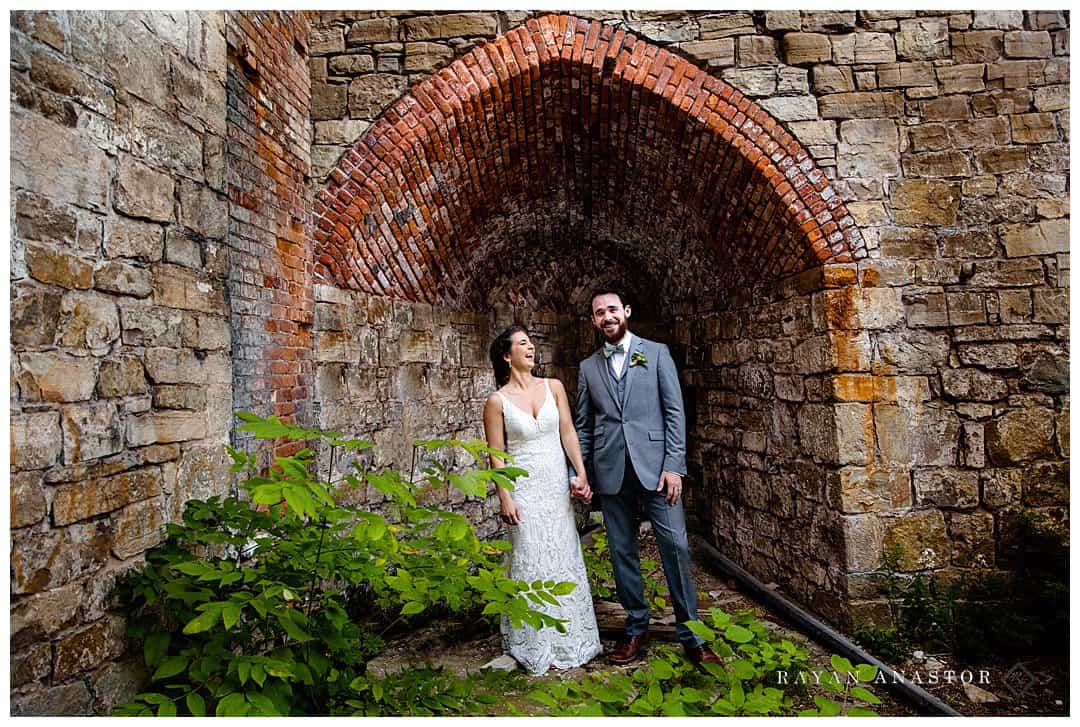 bride and groom smiling at first look