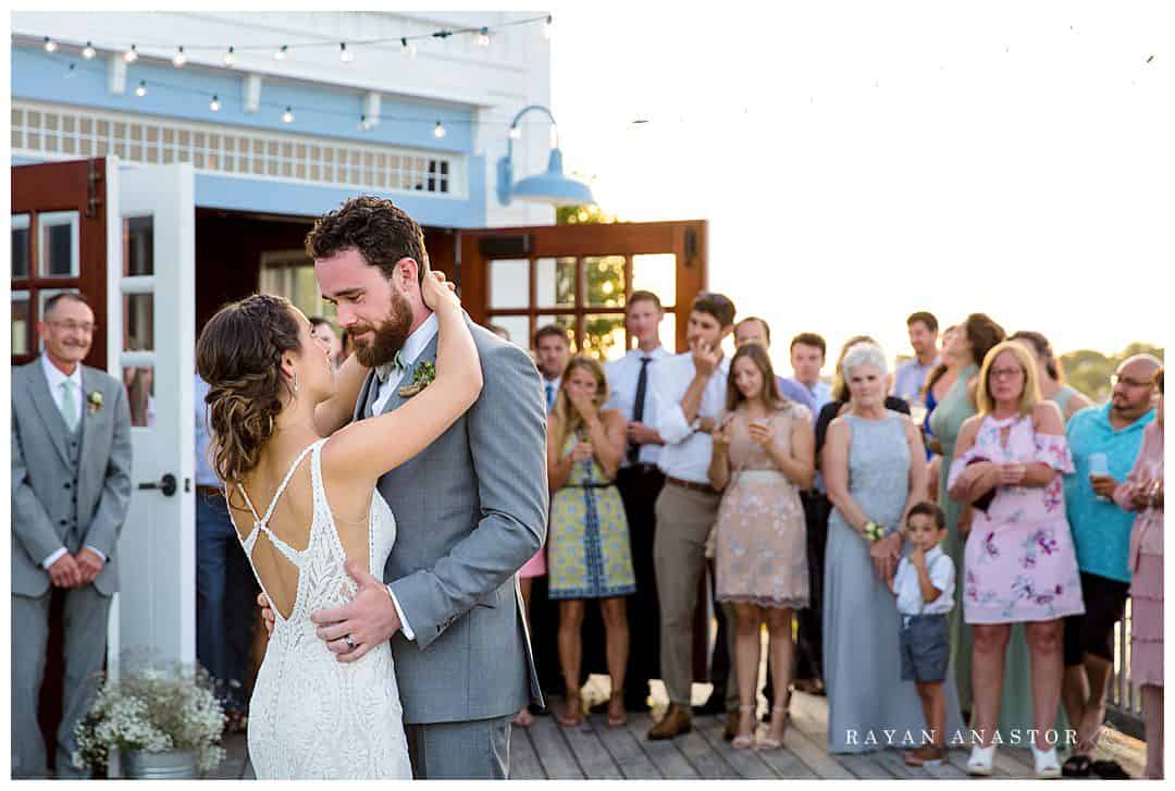 first dance for bride and groom on outside deck