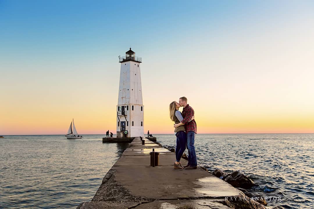 Engagement photo on Frankfort Pier in front of lighthouse