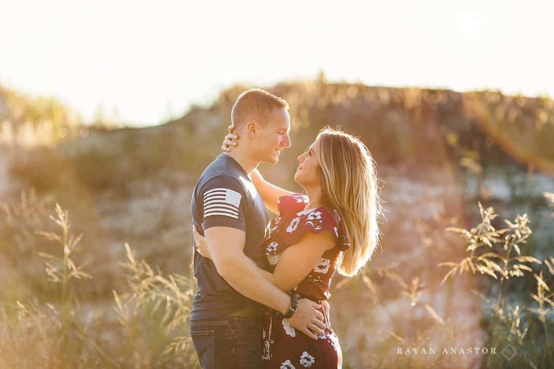 sunset engagement photos in sand dunes