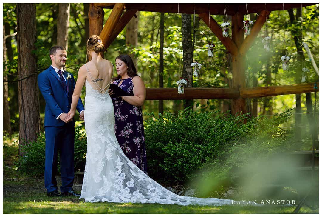 bride and groom getting married at leelanau school