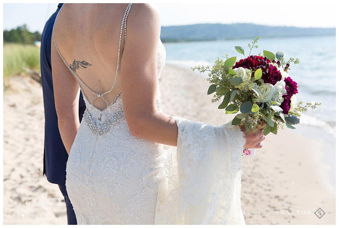 bride and groom at beach in Northern Michigan