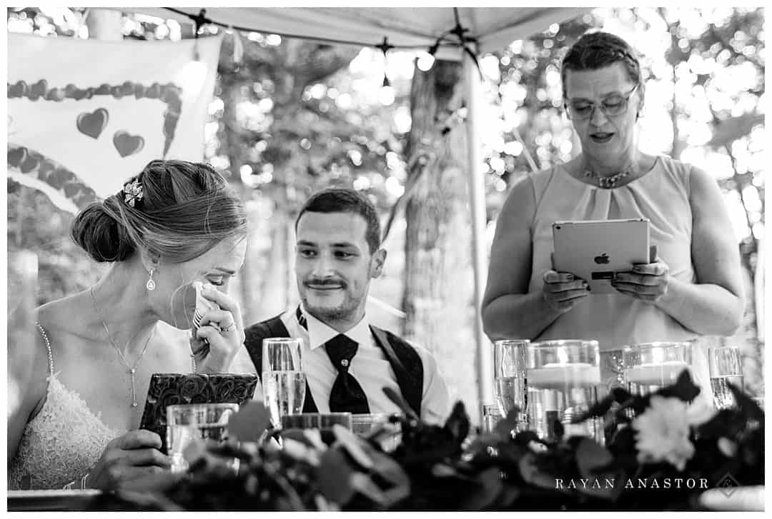 bride crying during toasts