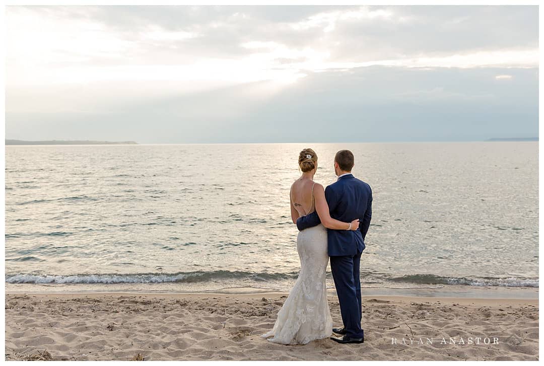 sunset photos on Lake Michigan for bride and groom