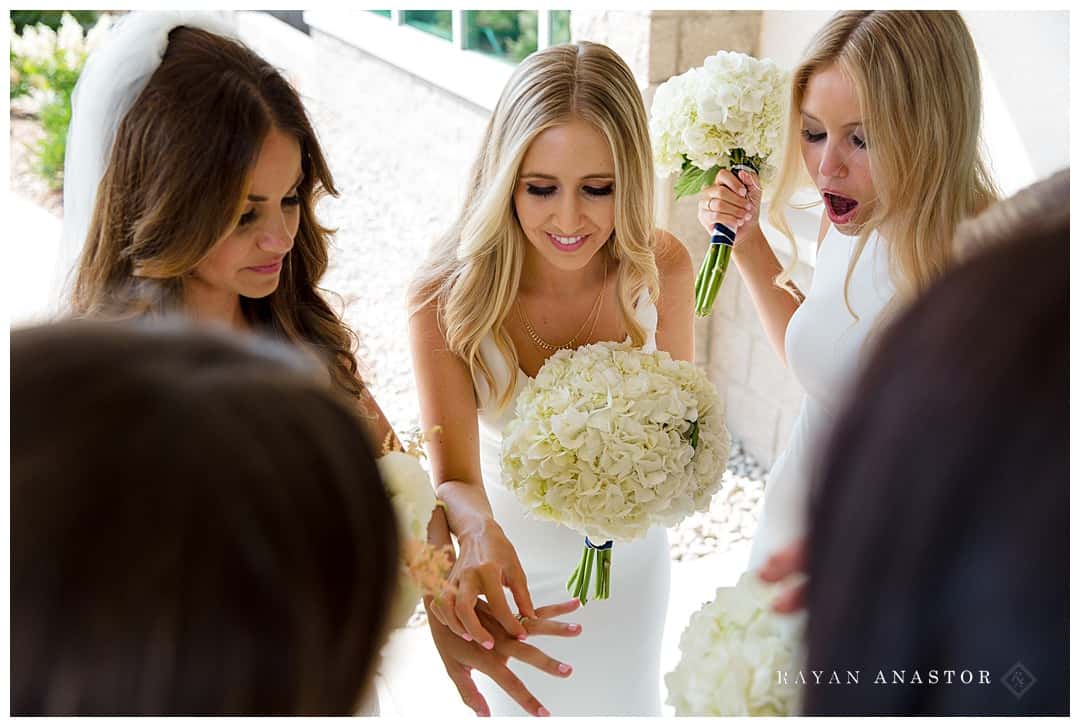 bridesmaids see wedding ring