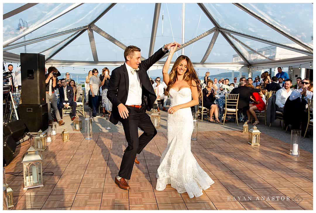 bride and grooms first dance on crystal lake