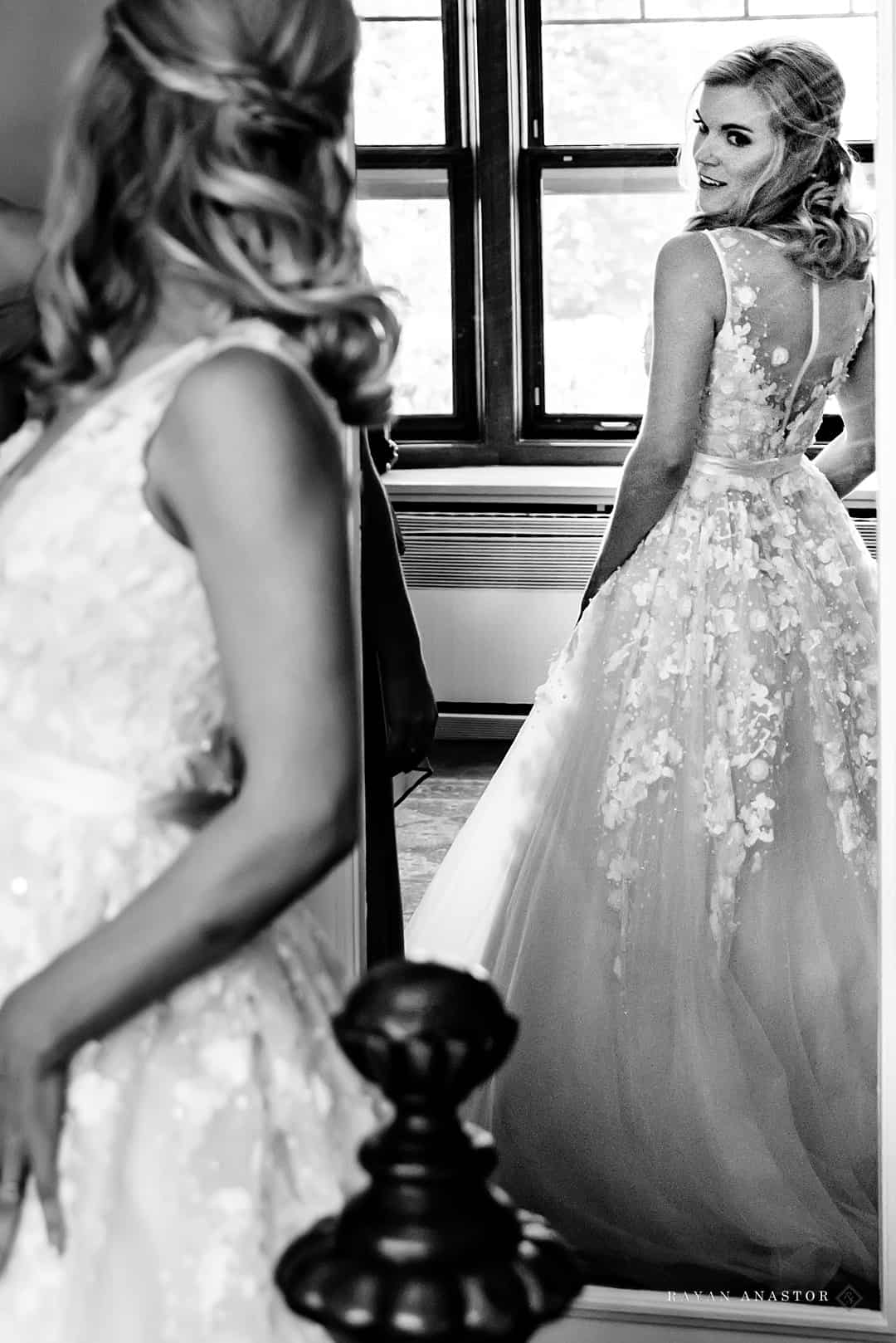 bride checking out her dress