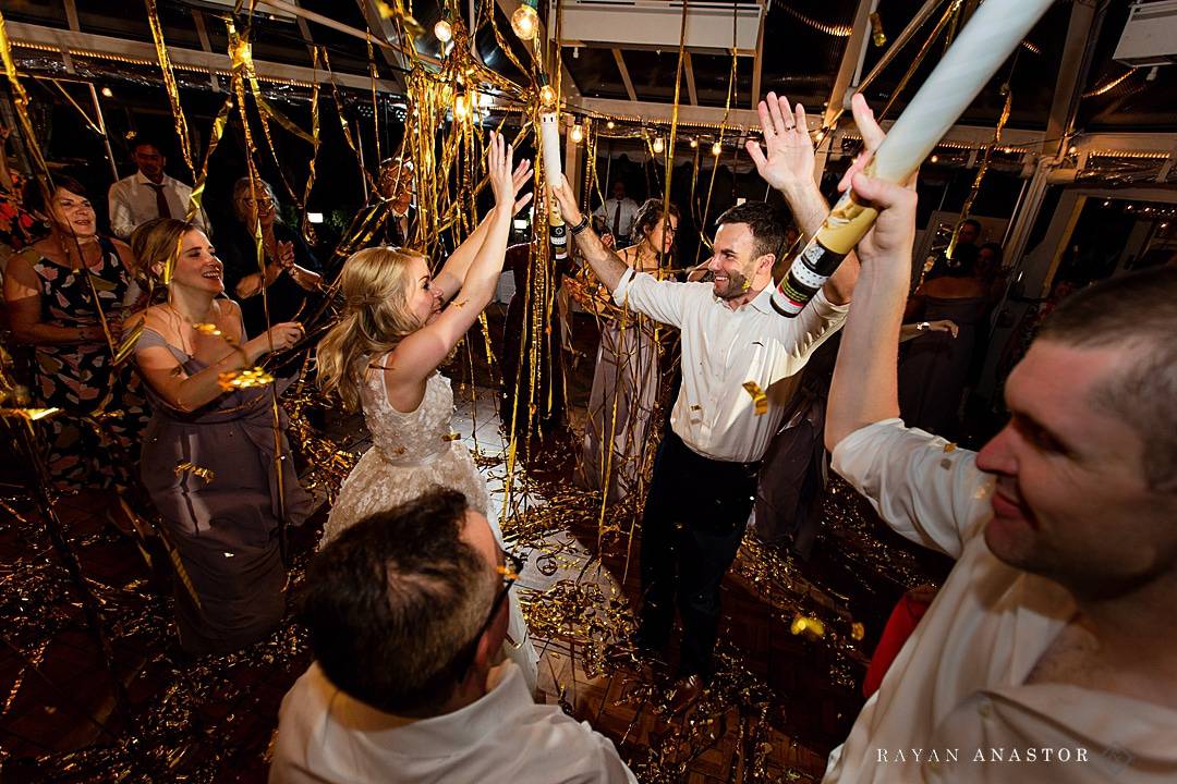 gold streamers at wedding reception