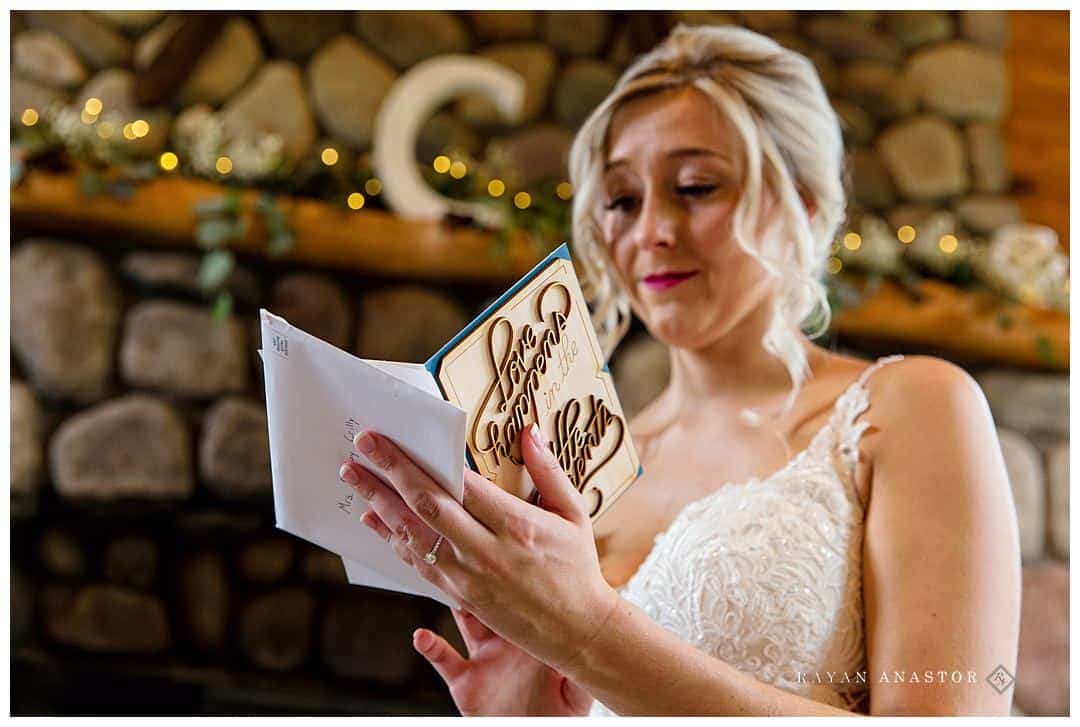emotional moment reading card from groom