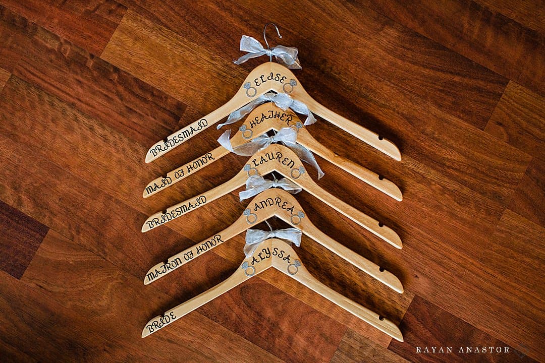 wedding hangers for bridal party with silver bows