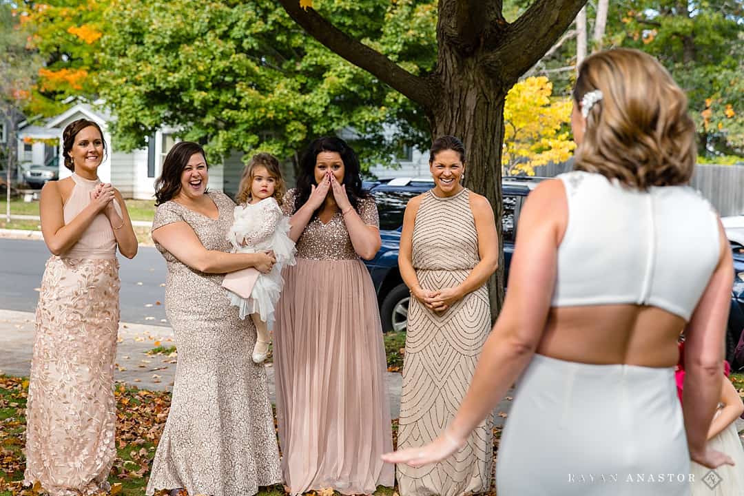 brides first look with bridal party