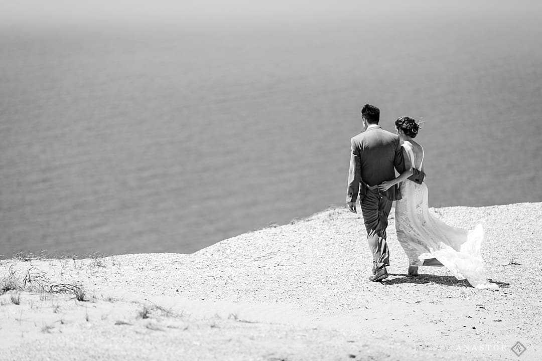bride and groom enjoying the view of Lake Michigan