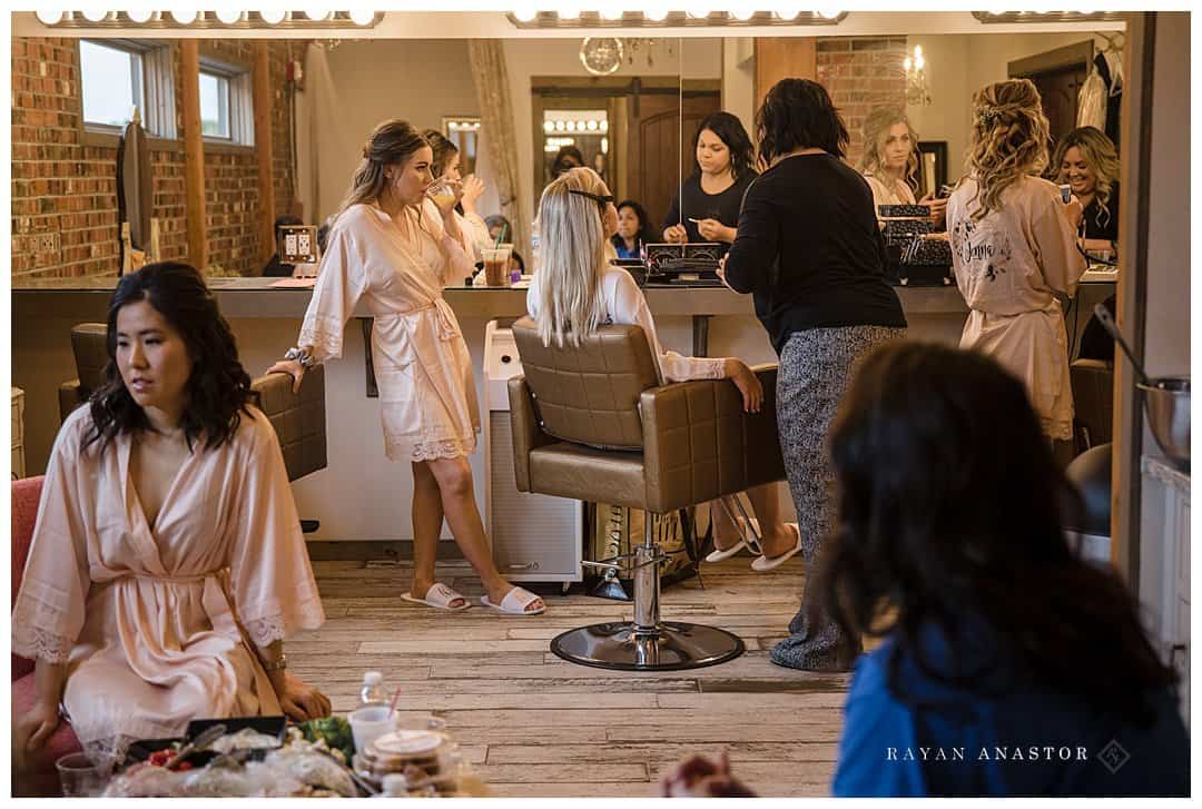 bride getting ready in the bridal suite