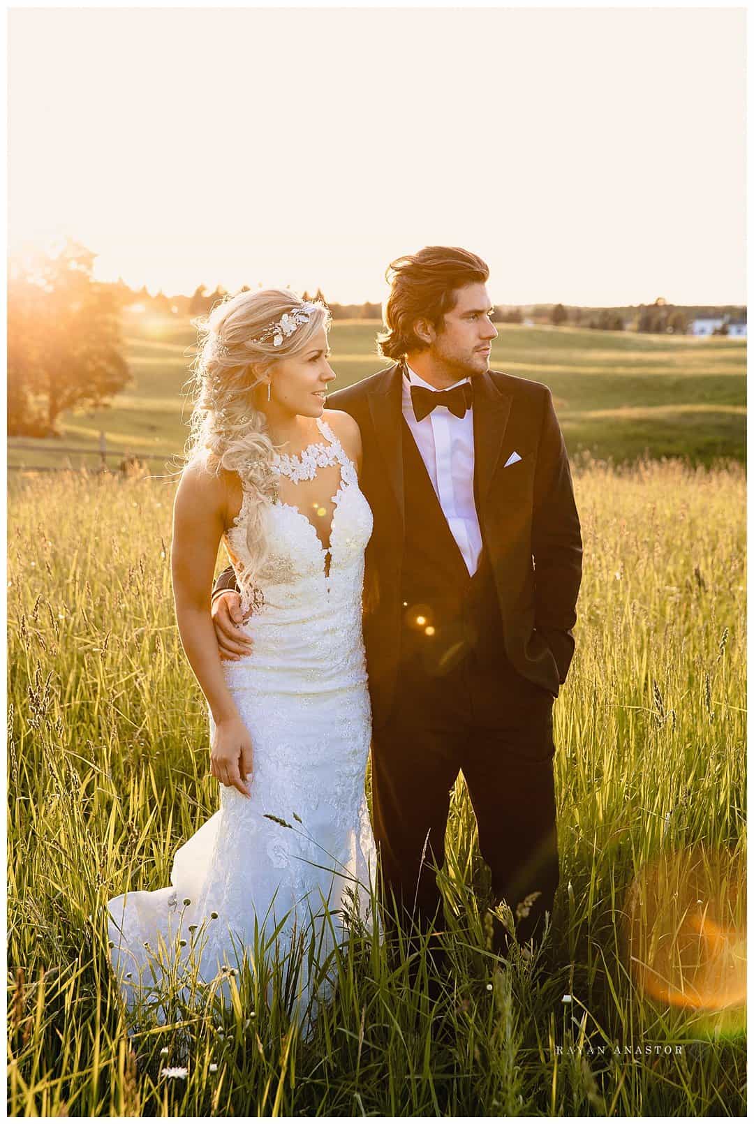 sunset field photos of bride and groom