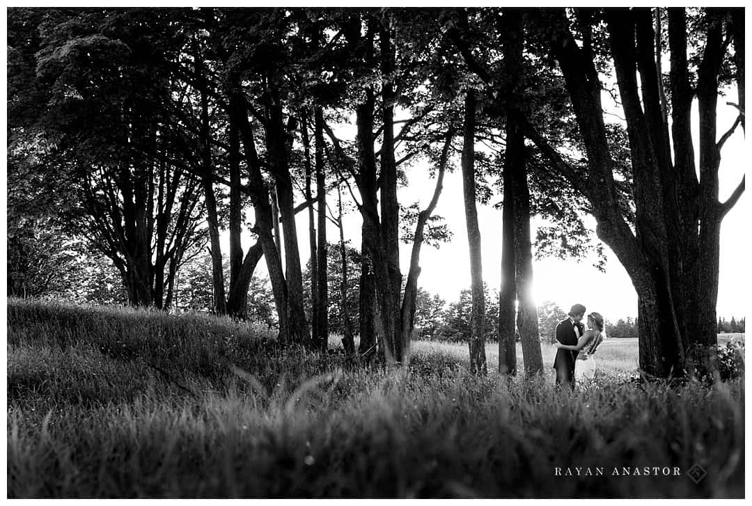 sunset field photos of bride and groom