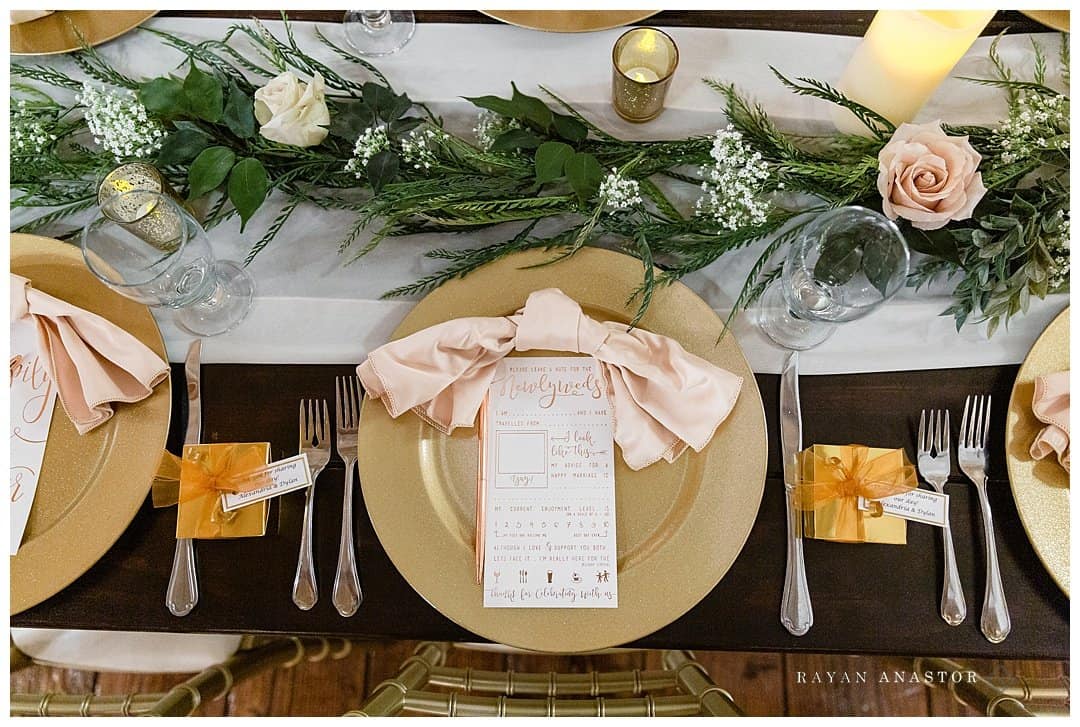 barn reception decorations in pink and gold