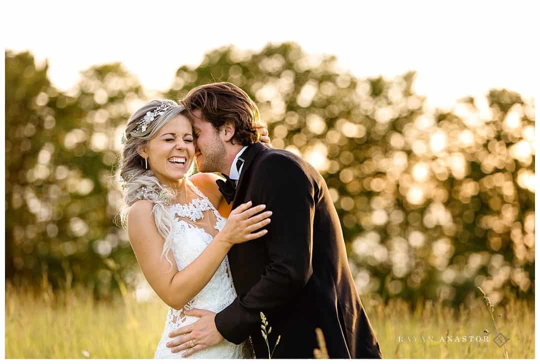 sunset wedding photos in a field