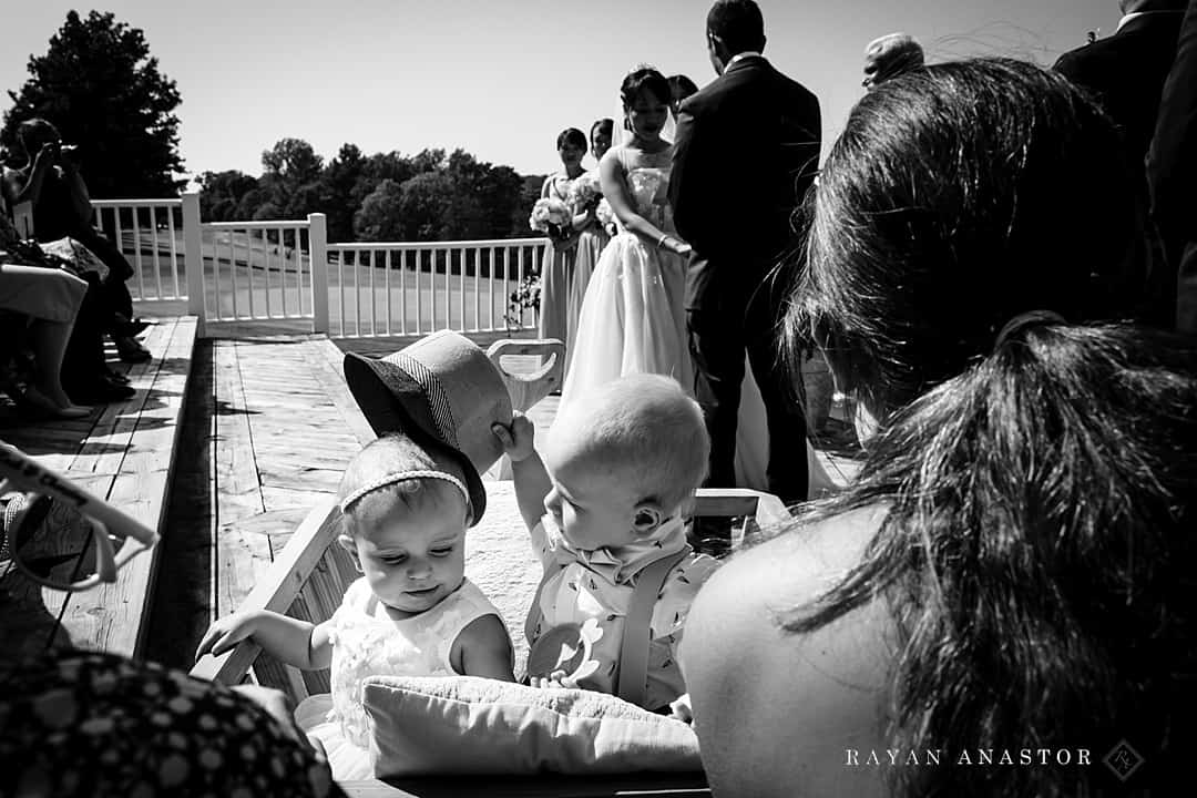 Ring Bearer and Flower Girl Playing during wedding