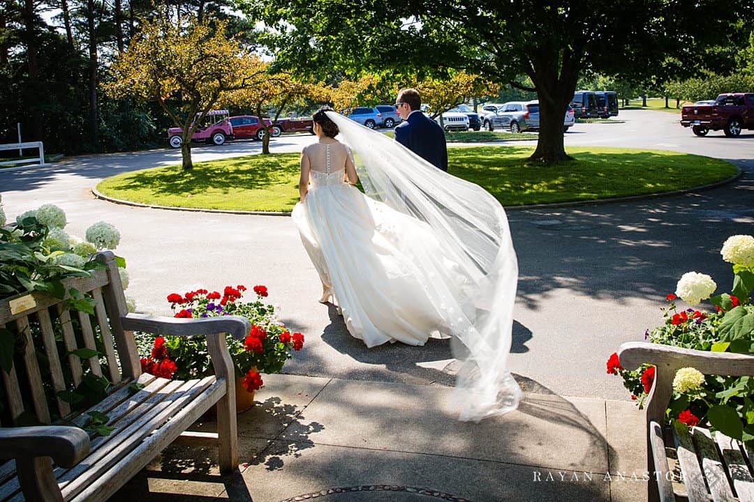 Brides veil blowing in wind