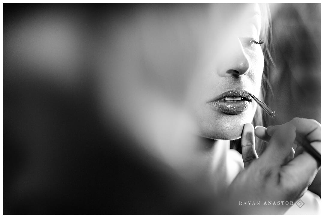 bride having lipstick applied