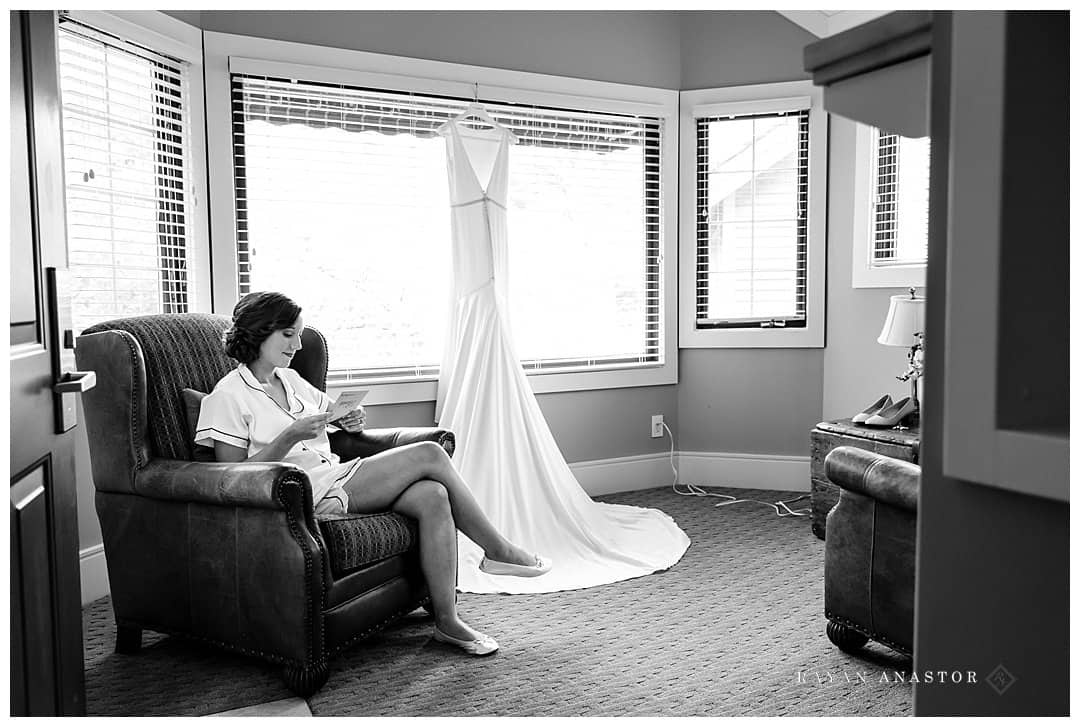 bride quietly reading letter from groom
