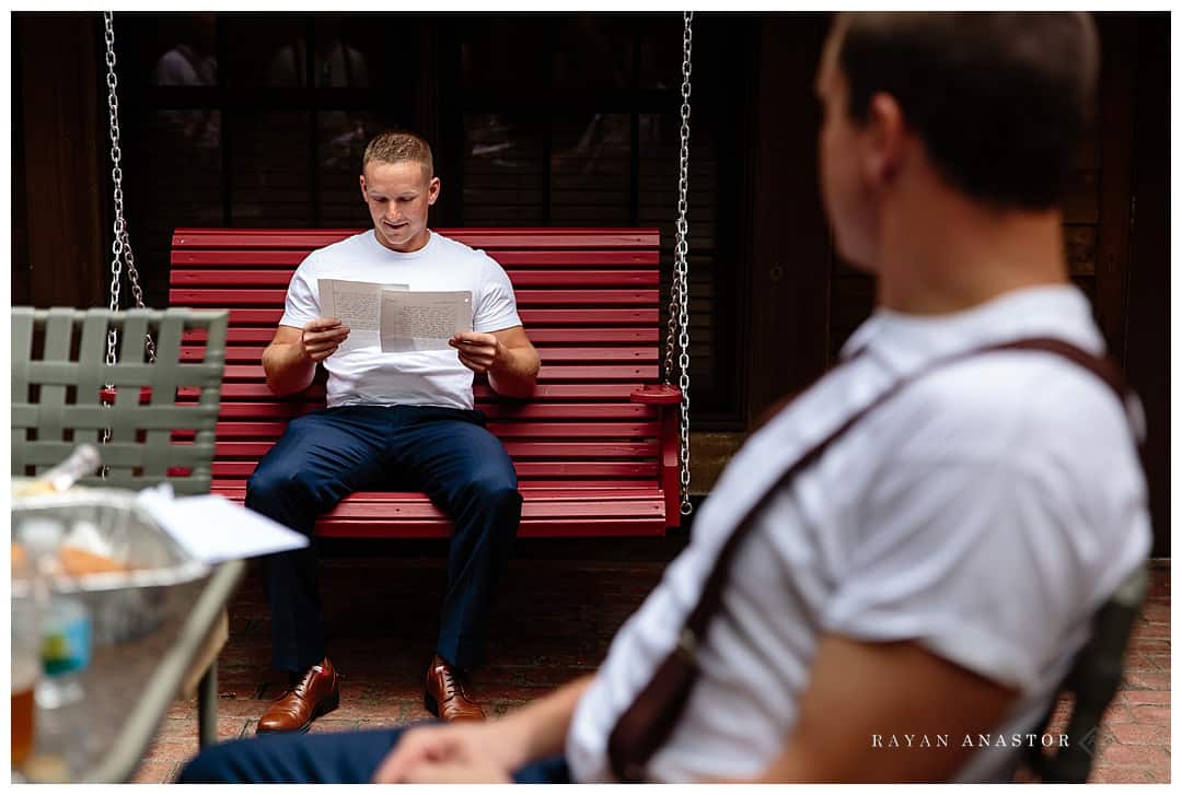 groom reading letting from bride