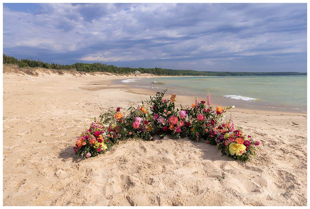 floral sand alter for beach wedding