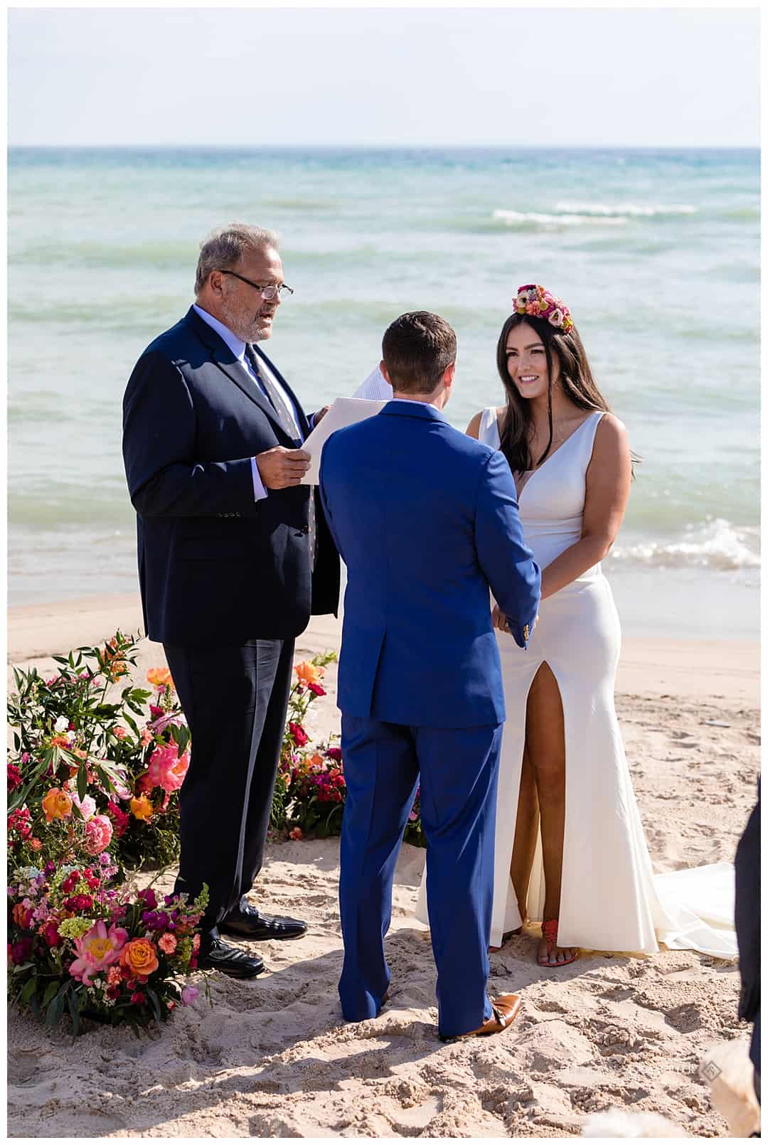 bride and groom getting married on Lake Michigan beach