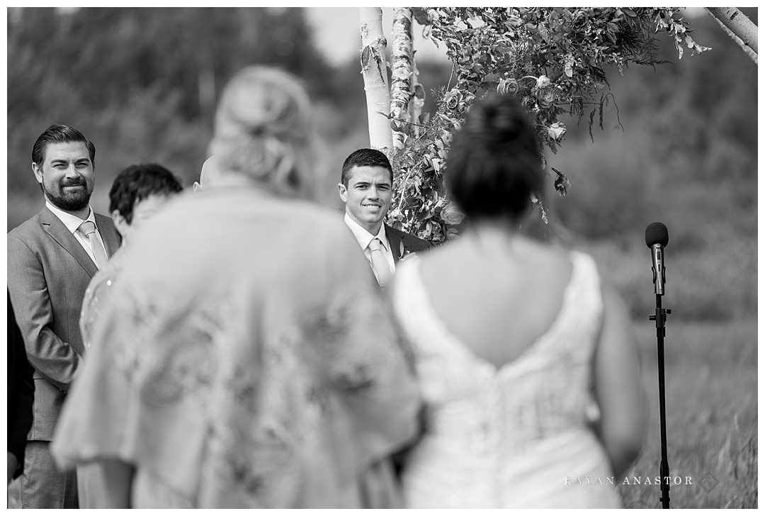 groom seeing bride for the first time in Northern Michigan