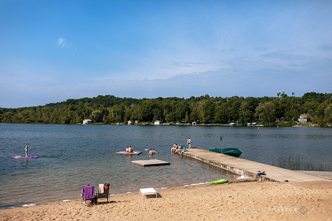 Wedding guests swimming in Lake Leelanau